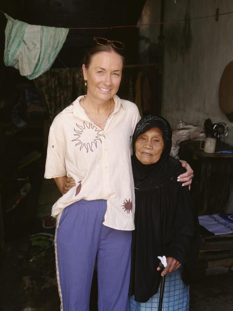 This locally led program is creating change for participants like Nandi (pictured) who receive cash support to help them survive flood disasters.